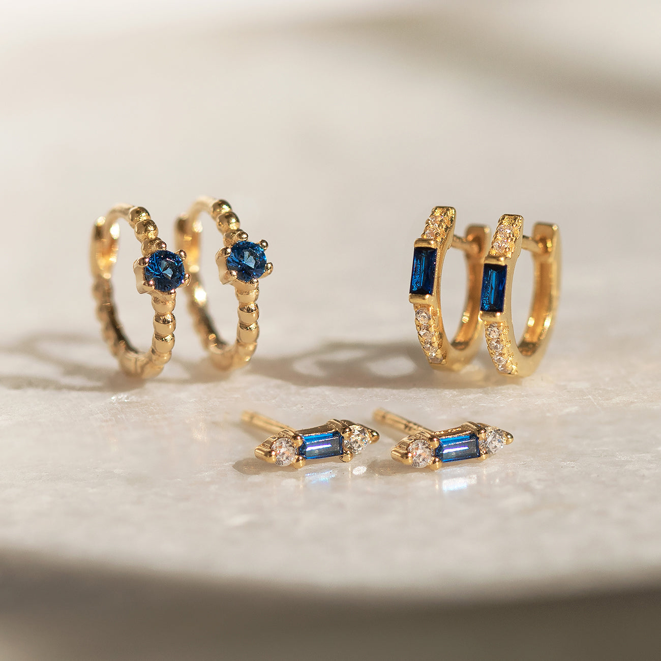 Huggie Baguette Earrings (Blue Sapphire)