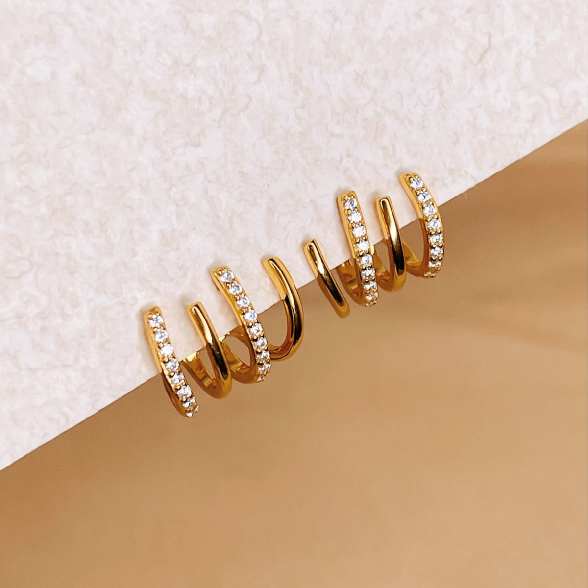 Huggie Earrings with Zirconia and Four-Sided Inlays
